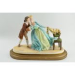 Renaissance Prestige Ladies figure 'The Stolen Kiss', on wooden gilt base, 39cm long. In good