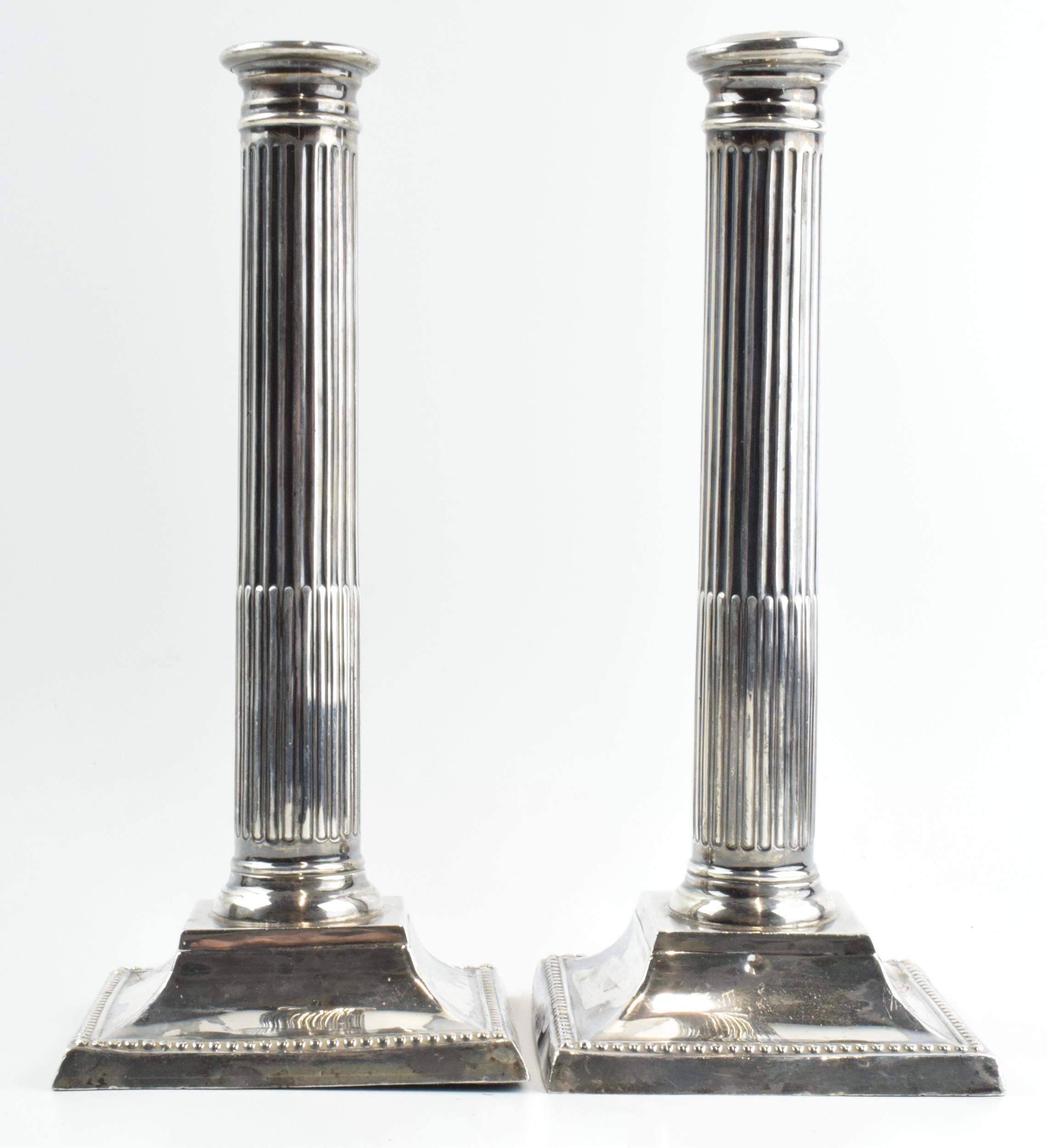 A pair of 26cm tall silver Corinthian column candlesticks, Birmingham 1908, with loaded bases, gross - Image 2 of 6