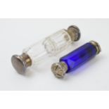 A pair of late 19th century double ended scent bottles to include a blue glass example with white