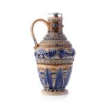 Doulton Lambeth ovoid jug with curved handle and white metal mount, with blue floral design,