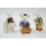 A trio of Royal Crown Derby paperweights in the form of a Schoolboy Teddy, The Gardener and THe
