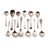 A good collection of silver condiment spoons of varying forms, sizes and ages, 58.4 grams (12).