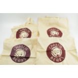 4 Charlie Bears cloth bags, 1 stained.