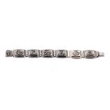 935 silver Chinese export silver panel link bracelet with dragon motifs, 33.7 grams, 20.5cm long.