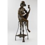 After Auguste Moreau: a bronzed Art Nouveau figure of a Flapper Girl posed on a chair, 'A Moreau' to