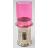 Hallmarked silver and pink glass tea light holder with match striker, London 2002. 13cm tall inc