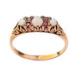 9ct gold garnet and opal set dress ring, 2.7 grams, size S.