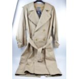 Classic vintage Burberrys' rain coat. Cream with classic cheque interior. Made in England.