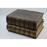 A pair of 19th century large leather bound Holy Bibles with colour plates present (2). Both