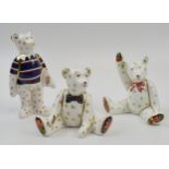 Royal Crown Derby trio of teddy bears. Two seated and one standing with rugby ball. (3) Height 9.