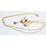 9ct gold chain with 9ct gold Edwardian pendant set with garnets, 2.2 grams.