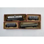 Four boxed mid 20th century Trix Twin Railway model locomotives, two operating dump wagons, one