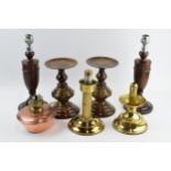 A collection of candlesticks to include a vintage wooden pair of turned examples and others (Qty),