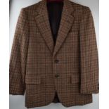 Lady's vintage tweed sporting jacket. Burberrys' of London. Approximate size 8 - 10. In good