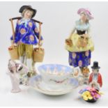 A collection of 20th century continental pottery to include a large pair of figures (both af), a