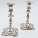 Victorian silver candlesticks with floral design, London 1892, gross weight 212.6 grams.