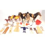 A good collection of vintage Sindy dolls and accessories. Equestrian themed outfits and horses.