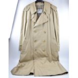 Classic vintage Aquascutum rain coat. Cream with classic cheque interior. Made in England.