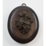 Large Victorian vulcanite Mizpah locket, 6cm tall.