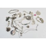 A collection of mostly sterling silver jewellery with some silver coloured / white metal items to