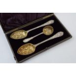 Cased silver plated berry spoons and sifter spoon, Mappin and Webb.