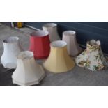 A collection of 7 large fabric lamp shades of varying forms (7), circa 45cm tall. Odd ones with