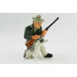Shebeg pottery (Isle of Man) figure of a man with gun with his collie dog, 13cm tall. In good