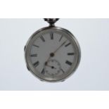 Hallmarked silver open face pocket watch, winds, ticks, sets and runs, 45mm wide, with gold (