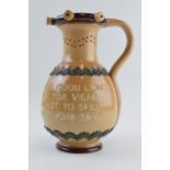Doulton Lambeth stoneware puzzle jug 'Within This Jug There Is Good Liquor....', 23cm tall. In