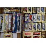 A large collection of boxed die-cast model trucks and cars. 2 Trays. In good condition. Boxed.