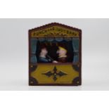 Reproduction metal Punch and Judy money box.