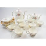 Minton Marlow tea service to include six trios, milk, cream, coffee pot and tea pot. In good