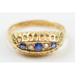 18ct gold ring set with diamonds and sapphires, 2.4 grams, size K.