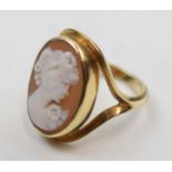 9ct gold cameo ring of a female profile with a flower, 4.7 grams, size M.