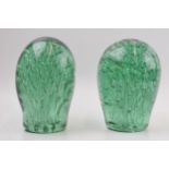 A near pair of Victorian green glass dumps, 16cm tallest (2).