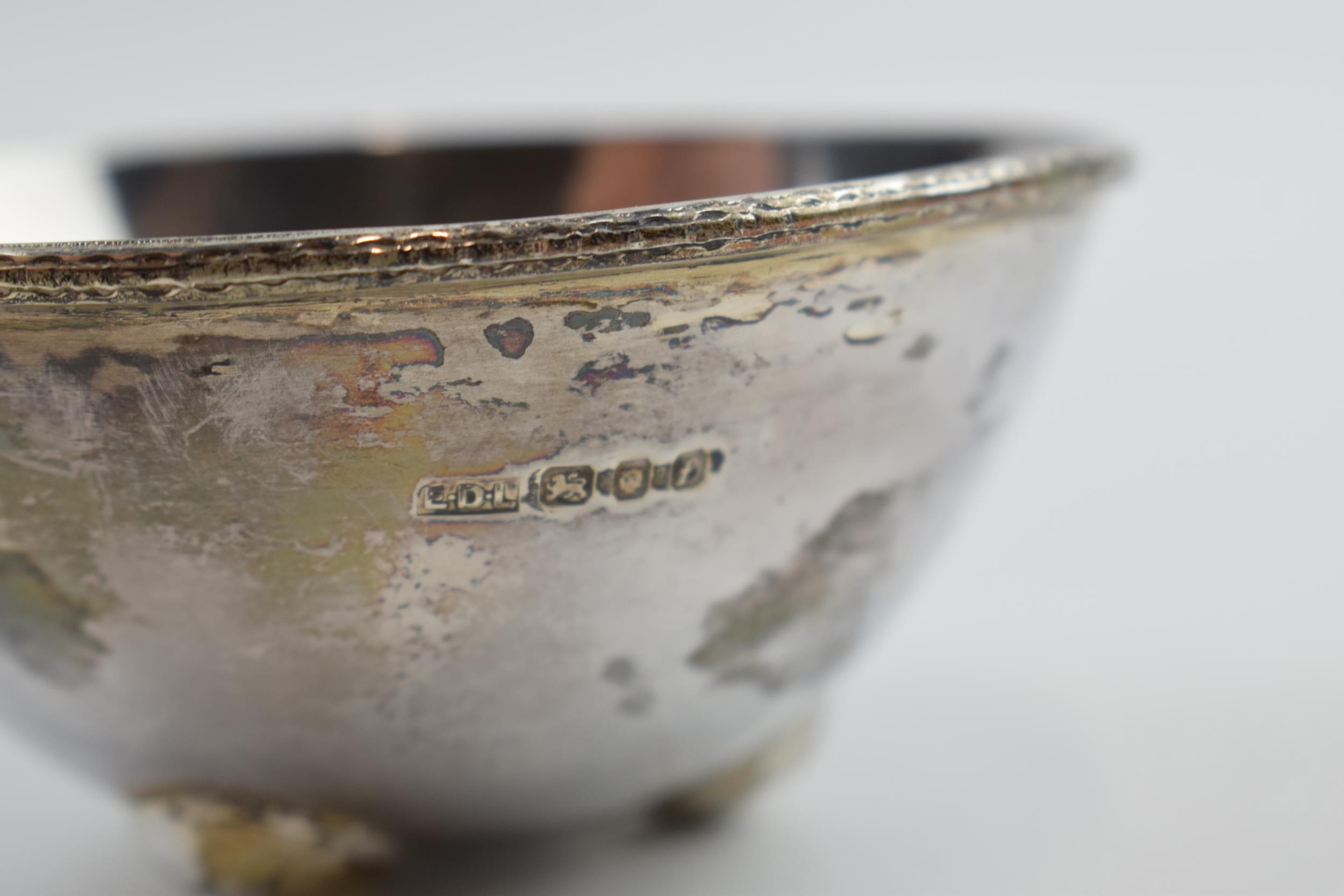 Unusual silver bowl with hammered design raised on 3 feet, 82.6 grams, 8cm diameter, London 1961, - Image 3 of 3