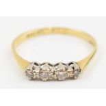 18ct gold and platinum diamond ring, set with 4 stones, 1.7 grams, size O.