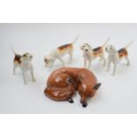 Beswick foxhounds with a lying fox 1017 (5) (fox af). Hounds are in good condition with no obvious