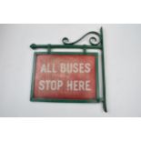 Original 'All Buses Stop Here' enamel sign mounted in metal frame, 36cm long.