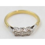 18ct gold and white gold (tests as) 3 stone diamond ring, 3.1 grams, size S/T.