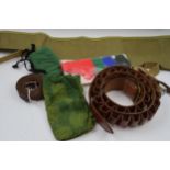 Group of shotgun accessories including quality leather cartridge belt, shooting sock gaiter set,