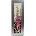 Moorcroft framed plaque in the Gladiolus pattern, by Nicola Slaney, red dot mark, 46cm inc. frame.