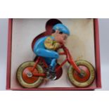 The Triang Gyro Cycle in original box. Early tinplate toy with original miniature Shell oil bottle