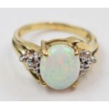 9ct gold opal and tiny illusion set diamond ring, 3.5 grams, size O.