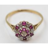 9ct gold diamond and ruby set ring, 2.0 grams, size R.