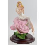 Franklin Mint figure Lady Rose on wooden base. In good condition with no obvious damage or