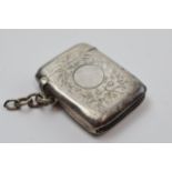 Hallmarked silver vesta case with engraved decoration, Birm 1909, gross weight 21.5 grams.
