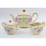 Sadler 1930s cube teapot, milk jug and lidded sugar bowl with a floral pattern (3). In good