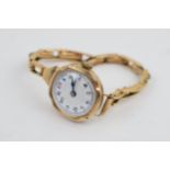 Early 20th century ladies 9ct gold wristwatch with Arabic numerals, on 9ct gold bracelet, gross