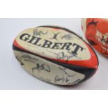 Two signed rugby balls, Webb Ellis and Gilbert c1990s. Possibly Leicester Tigers. Showing signs of